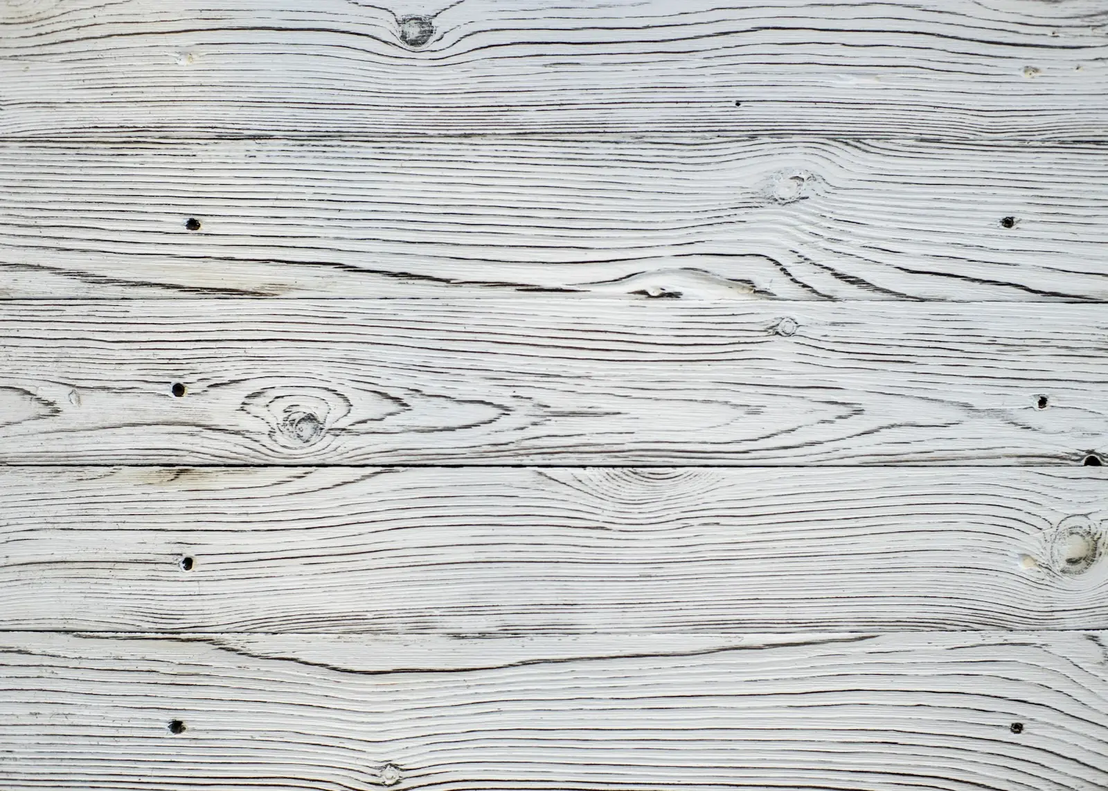 Textura de tábuas de madeira envelhecida, tom cinza e veios marcados